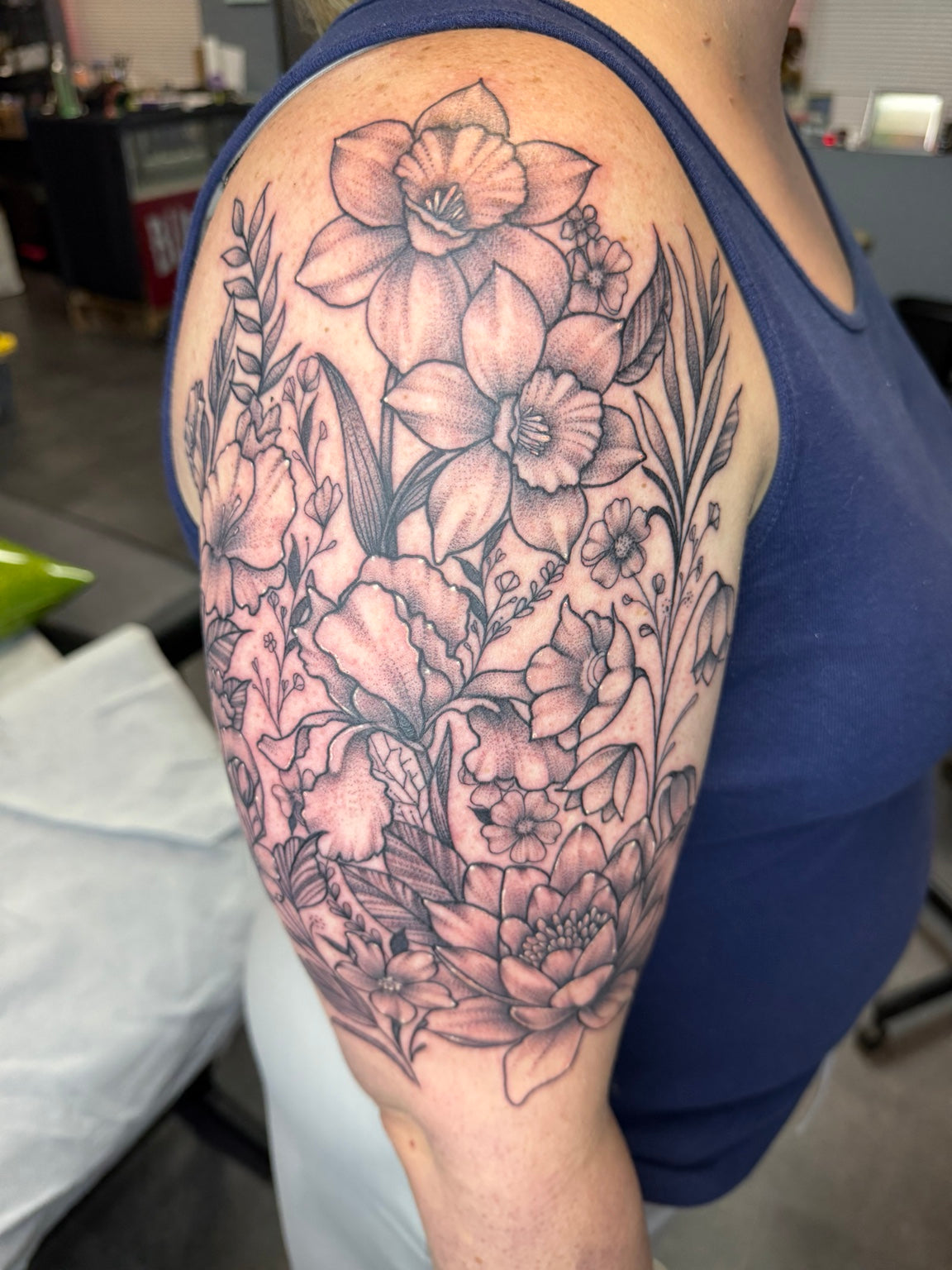 Detailed black and grey flower tattoo — by Chelsea Hughes
