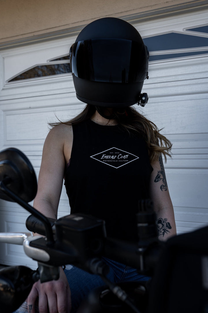 ECMC Crop - The Women’s Racerback Top features